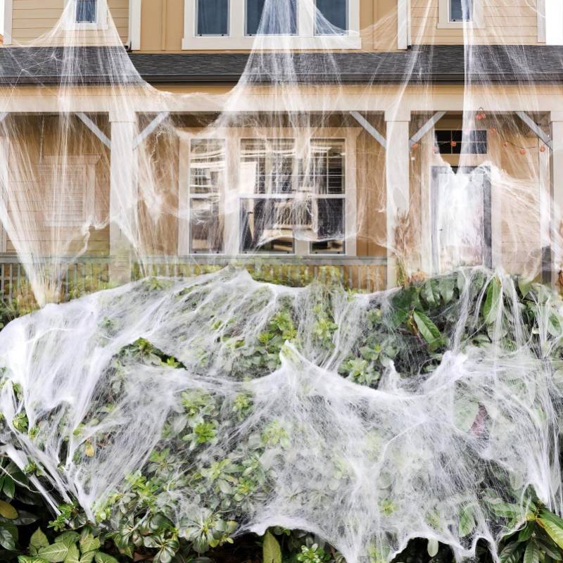 lot 34868 image: 1000 sqft Spider Webs Halloween Decorations Bonus with 30 Fake Spiders, Super Stretch Cobwebs for Halloween Indoor and Outdoor Party Supplies