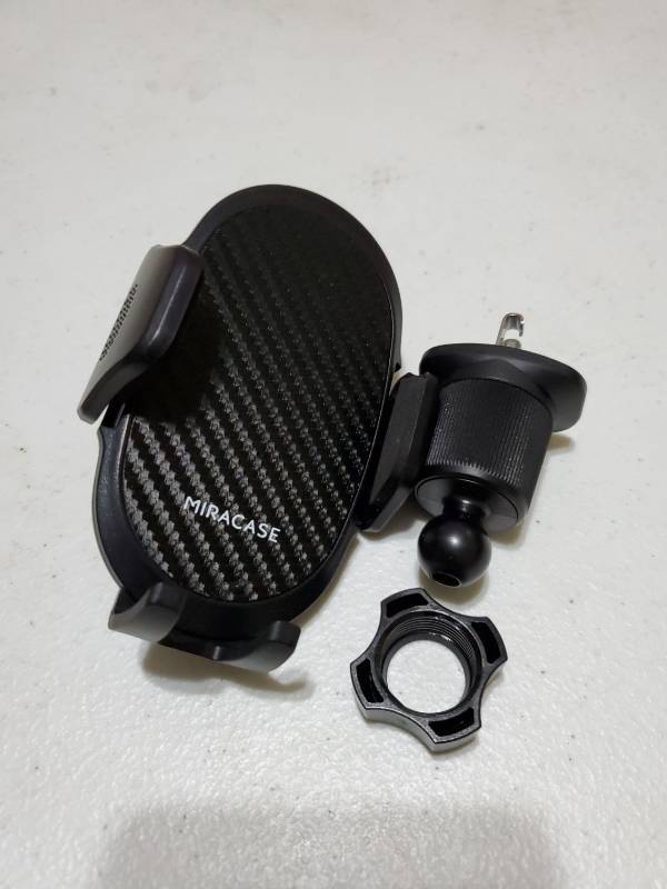 lot 34897 image: Miracase Phone Holders for Your Car with Metal Hook Clip, Air Vent Cell Phone Stand Car Mount, Universal Automobile Cradle for Garmin GPS Fit iPhone Android and All Smartphones, Dark Black - Retail $12