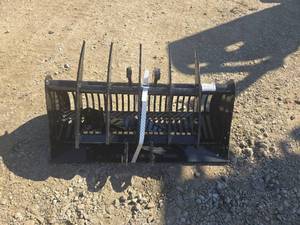 lot 10509 image: Mini Excavator 3 Piece Set  32in Sand Bucket  Ripper  Rake