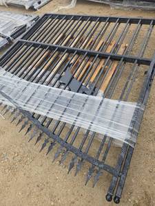 lot 10619 image: Unused 14 Ft Bi-Parting Wrought Iron Gate