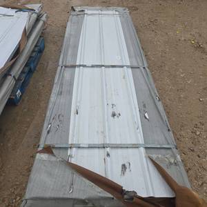 lot 10712 image: Unused Qty. 50 Galvalume Steel Siding  Roofing Panels  White  Cream