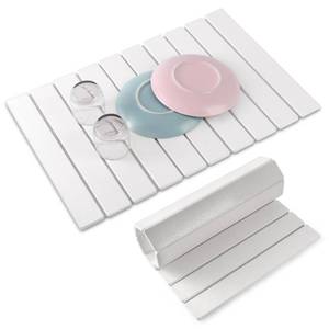 lot 6390 image: cuomaop Stone Dish Drying Mat for Kitchen Counter, 23x15.3 Inch Large Fast-Absorbing Diatomaceous Earth Drying Pad, Quick Dry Foldable Stone Dish Mats for Countertop Dishes, Bottles, Cups and Utensils