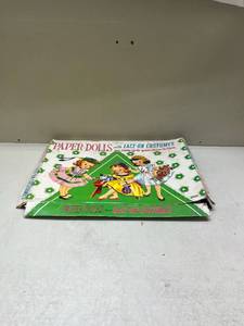 lot 295 image: Paper Dolls with Lace-On Costumes Book Set
