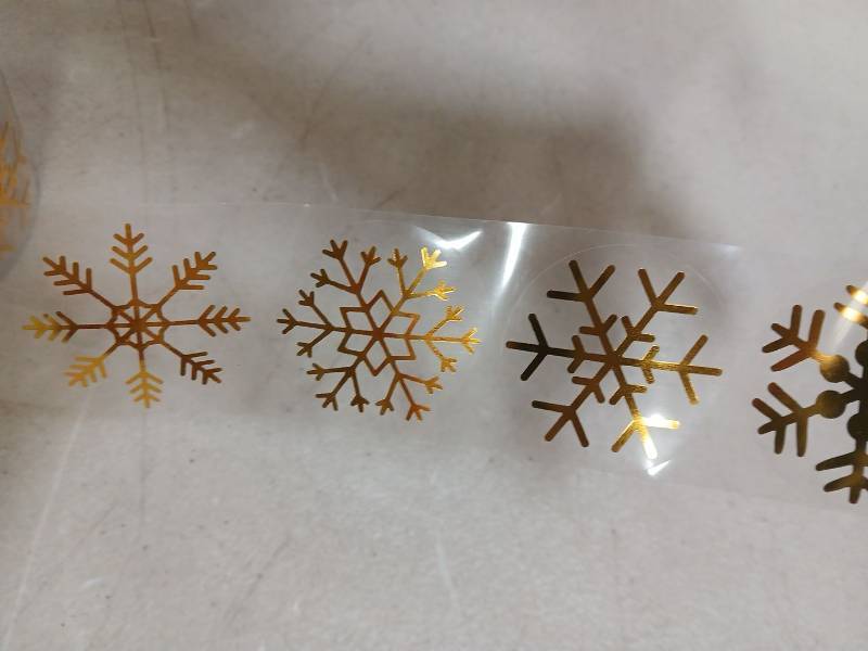 lot 30032 image: Gold Snowflake Window Clings 1 Roll