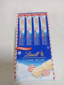 lot 21271 image: Lindt Peppermint Classic Recipe White Chocolate Sticks 24pk - Retail $16