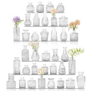 lot 63083 image: 36Pcs Bud Vases Set Small Vintage Glass Bottles Clear Bud Vases in Bulk Multiple Shape Cute Glass Vases for Rustic Wedding Centerpieces Table Decorations and Home Decor(Clear) - Retail $38