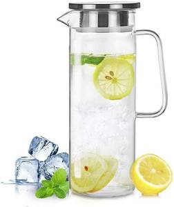 lot 49213 image: Borosilicate Glass Pitcher with Lid - Heat Resistant Carafe with Handle for Fridge, Iced Tea, Milk, Hot & Cold Beverages - 1.2L40Oz Jug - Retail $23