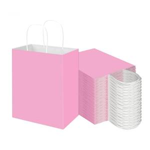 lot 49245 image: Toovip 100 Pack 8x4.75x10 Inch Medium Light Pink Kraft Paper Bags with Handles Bulk, Gift Wrap Bags for Favors Grocery Retail Party Birthday Shopping Business Goody Craft Merchandise Take Out Sacks - Retail $28