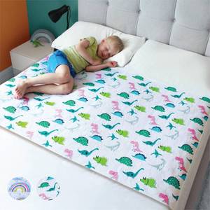 lot 59376 image: Hygge Sheets Potty Training Pee Pads for Kids, Toddlers - 100% Waterproof, Non Slip Bed Wetting Pad for Full Size Beds - Washable, Reusable Mattress & Sheet Protector - Dinosaur - Retail $33