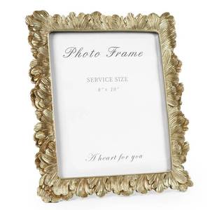 lot 59392 image: Cuspin 8x10 Picture Frame Vintage Gold Frames, Elegant Photo Frame with Glass Front, Palm Leaves Textured Hand-Crafted Resin Frame for Wall and Tabletop Display Home Decor - Retail $30