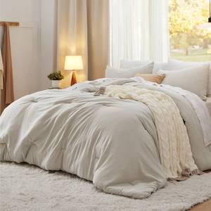lot 63121 image: Bedsure Oversized Queen Comforter Set, Beige Soft Prewashed Bedding for All Seasons, 3 Pieces GentleSoft Bed Set, 1 Lightweight Comforter (98x98) and 2 Pillowcases (20x26) - Retail $55