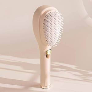 lot 636 image: Retractable Massage Comb Portable Anti-static Hair Combs Cleaning Hair Brush Hair Styling Tool (Beige)