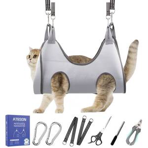 lot 659 image: Pet Grooming Hammock Harness for Cats & Small Dogs (XXS), Dog Nail Trimming Sling with Clippers, Scissors & Nail File, Hanging Holder for Easy Grooming & Nail Care - Retail $30
