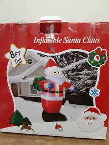 lot 704 image: 8 Foot Inflatable Santa Claus Christmas Decoration - Retail $35