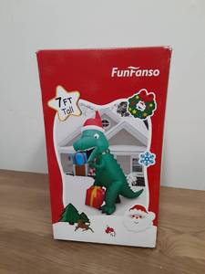 lot 705 image: 7ft Christmas T-Rex Inflatable by FunFanso - Retail $49