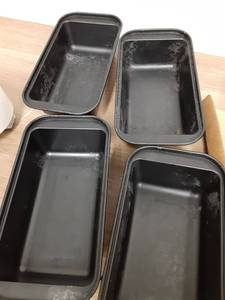 lot 715 image: Pre Owned, Four pack Small Loaf Pans Baking Tray Mold 8x4, 2 Deep - Retail $0
