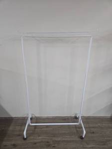lot 34 image: White Metal Rolling Garment Rack with Shelf