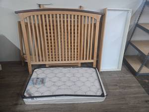 lot 57 image: Wooden baby crib, wbottom drawer no hardware.