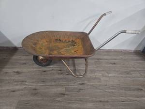 lot 65 image: Metal Garden Wheelbarrow (wheel doesnt move Garden decor)