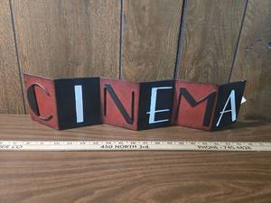 lot 71 image: Metal CINEMA Sign with Red and Black Design