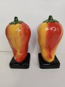 lot 149 image: Hand-Painted Ceramic Bell Pepper Salt and Pepper Shakers