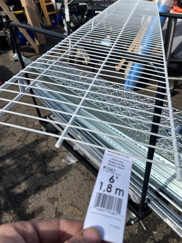 lot 55 image: Closet Maid Shelf and Rod 6 ft. x 12 in. Ventilated Wire Shelf