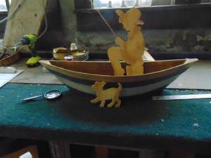 lot 2731 image: Wall Decor - Boat Wfisherman and Dog