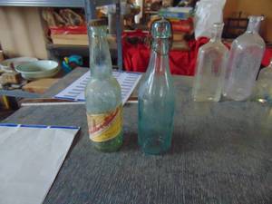 lot 2777 image: Pair of Vintage Beer Bottles