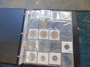 lot 3145 image: Binder with Wooden Nickels - Coins and TacksTokens