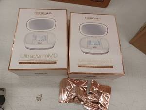 lot 26474 image: Trophy Skin UltradermMD 3-in-1 Skincare System, lot of 2
