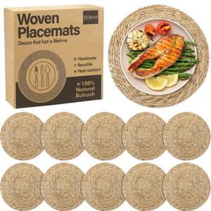 lot 7747 image: Elcoho 10 Pieces Round Woven Placemats 13.8 Inch Boho Rattan Placemats Farmhouse Braided Place Mats Woven Plate Chargers Rustic Wicker Table Mats for Dining Table