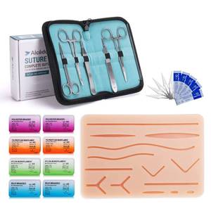lot 7854 image: Alcedo Suture Practice Kit for Medical Students  Complete Set (32 Pieces) Include Durable Large Suturing Pad with Pre-Cut Wounds, Tools Kit, and Suture Threads for Educational Use Only