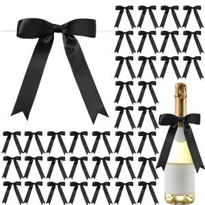 lot 35324 image: Black Satin Ribbon Bows 5x7 Inch Large Twist Tie Bow for Gift Wrapping Champagne Bottle Balloon Treat Bag DIY Craft Decor Wedding Bridal Baby Shower Birthday Holiday Party - Retail $14