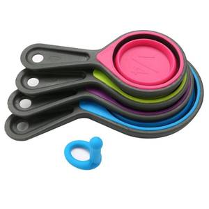 lot 32673 image: Collapsible Silicone Measuring Cups with 60ml80ml125ml250ml - 4 Piece Set Kitchen Measuring Tools (4 Colors) - Retail $7