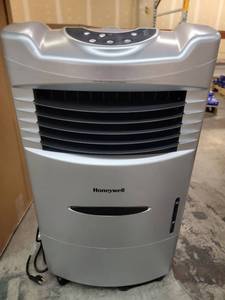 lot 56746 image: Honeywell Indoor Portable Evaporative Air Cooler & Humidifier (White & Grey models) - 7 ct.