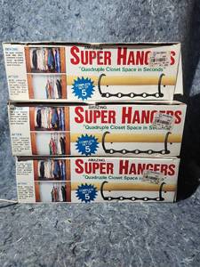 lot 222 image: Lot of 5 Sets of 5.  Super Hangers Space Saving Closet System - Set of 5