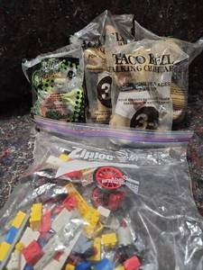 lot 327 image: Taco Bell Talking Chihuahua Promotional Toys With Legos and Scooby Doo