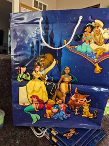 lot 364 image: 7 LARGE DISNEY GIFT BAGS - Disney Characters Gift Bag with Castle Scene