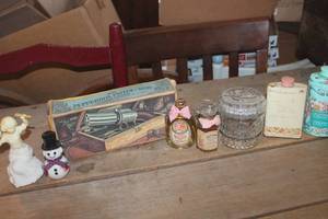 lot 3657 image: Vtg. Avon Bottles, Talc Tins & More