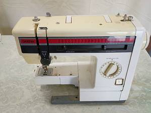 lot 8 image: Brother Sewing Machine Model K01112303 no face, no cord