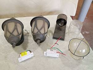 lot 11 image: Outdoor Wall Lanterns with Moes Smart Switch Conversion one glass globe one plastic