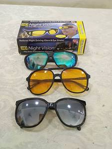 lot 53 image: HD Night Vision Anti-Glare Driving Glasses and other glasses items as pictured.