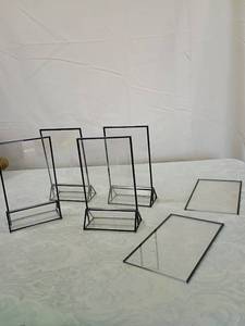 lot 55 image: Plastic and Metal Display Stands Set items as pictured