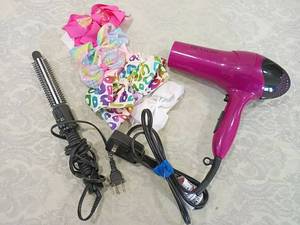 lot 63 image: Revlon Hair dryer curling iron and bows