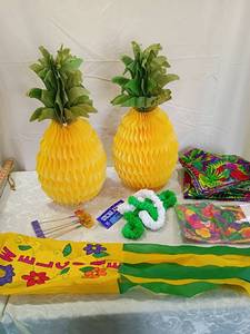 lot 78 image: Tropical Luau Party Decoration Set fabric included as well