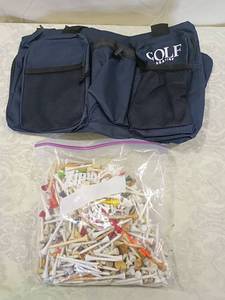 lot 87 image: Golf Magazine Bag with  Mixed Golf Tees