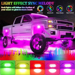 lot 44393 image: 4 Pods RGB LED Rock Lights, Underglow Multicolor Neon Light Kit, Wheel Well Light with APP Control & Music Mode, Under Glow Lights for Trucks, Jeep, SUV, Golf Cart, ATV, Pickup Off Road,12V - Retail $24