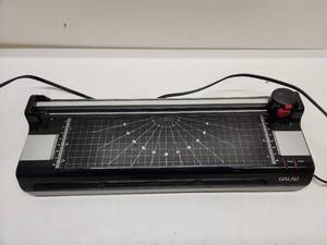 lot 37 image: UALAU A4 Laminator and Paper Cutter