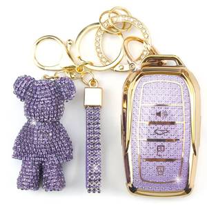 lot 4378 image: Rayslesan Cute Key Fob Cover with Rhinestone Bear Charm, Bling TPU Smart Key Case for Women, Compatible with Toyota Hilux Corolla Land Cruiser Venza RAV4 prime Sienna Fortuner (4-Button, Gold Purple)