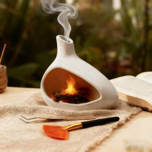 lot 13521 image: Guedawv Palo Santo Holder, Ceramic Incense Burner for Sticks Sage Holders Cone Burning Smudge Bowl with Ash Brush for Meditation Yoga Spa Room Decor (White) (used)